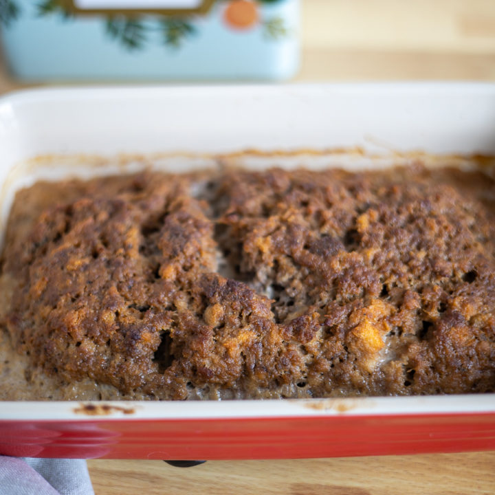a cooked meatloaf in a baking dish