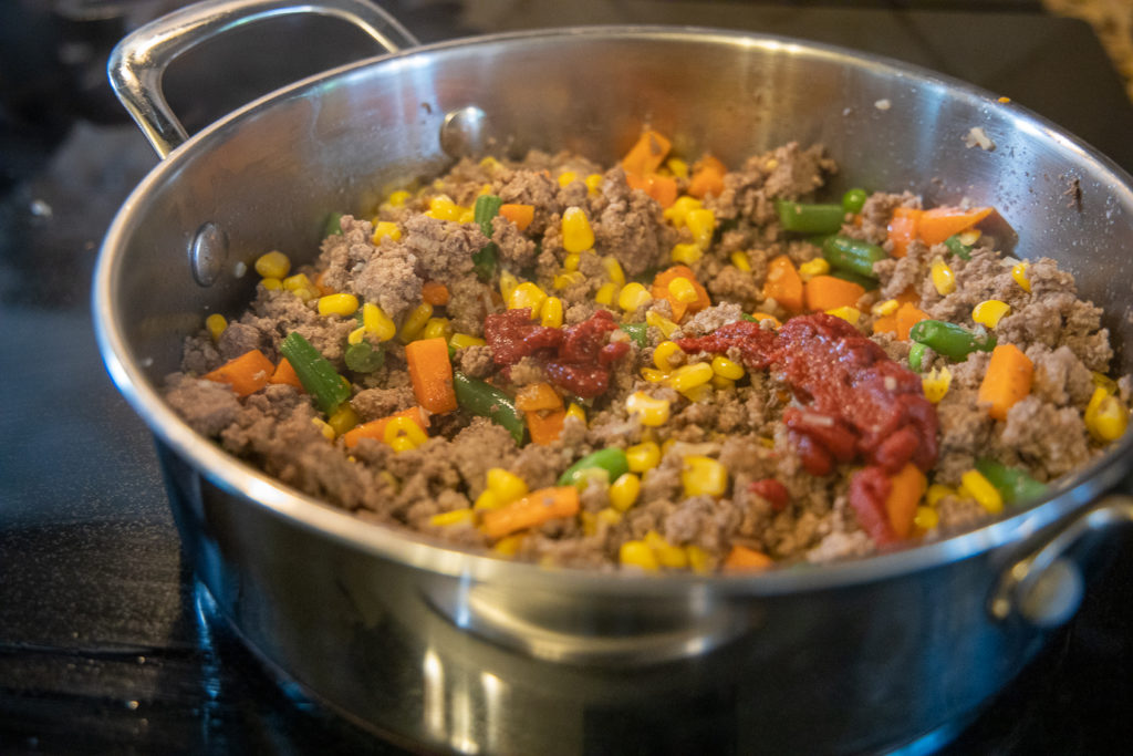 the shepherd's pie mixture with tomato paste and Worcestershire sauce added
